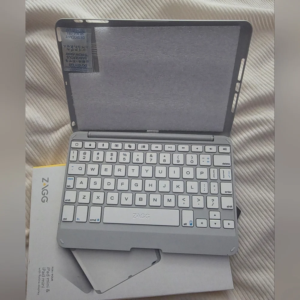ZAGG Folio hinged keyboard folio for ipad mini. New In Box